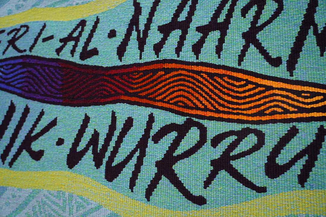 ‘Wurundjeri Biik, yalinguth, yalingbu, yirramboi’ (Wurundjeri Country, yesterday, today, tomorrow) tapestry designed by Wurundjeri-willam (Wurundjeri-baluk patriline) artist Mandy Nicholson.