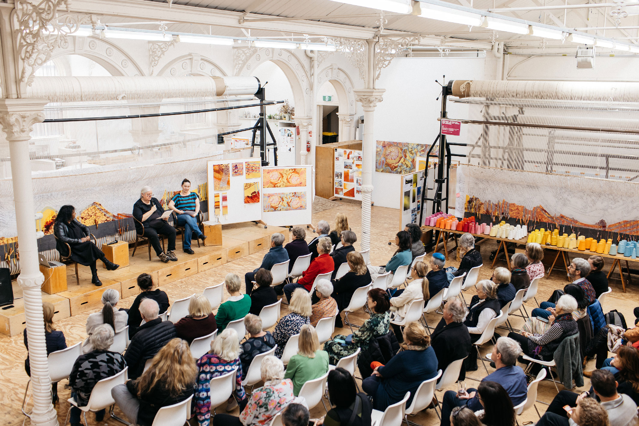 ATW hosting an event with Maree Clarke and ATW Master Weavers. Its a big bright space filled with people.