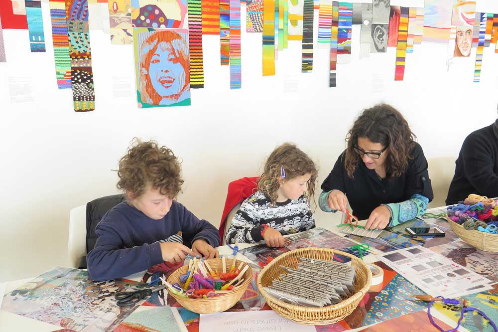 Children learning to weave at Open House Melbourne day at the ATW in 2018. Photo: ATW.