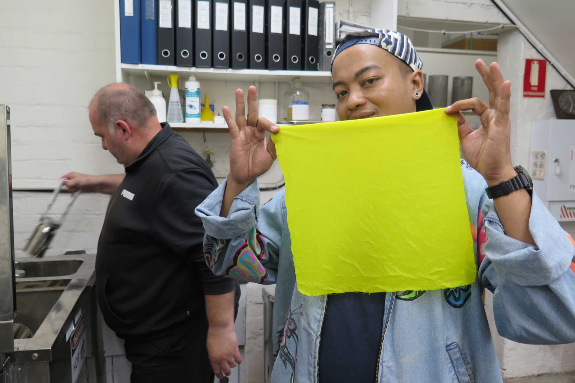 Dias Prabu working with ATW dyer Tony Stefanovski in the colour laboratory. Photo: Dewie Bukit. 