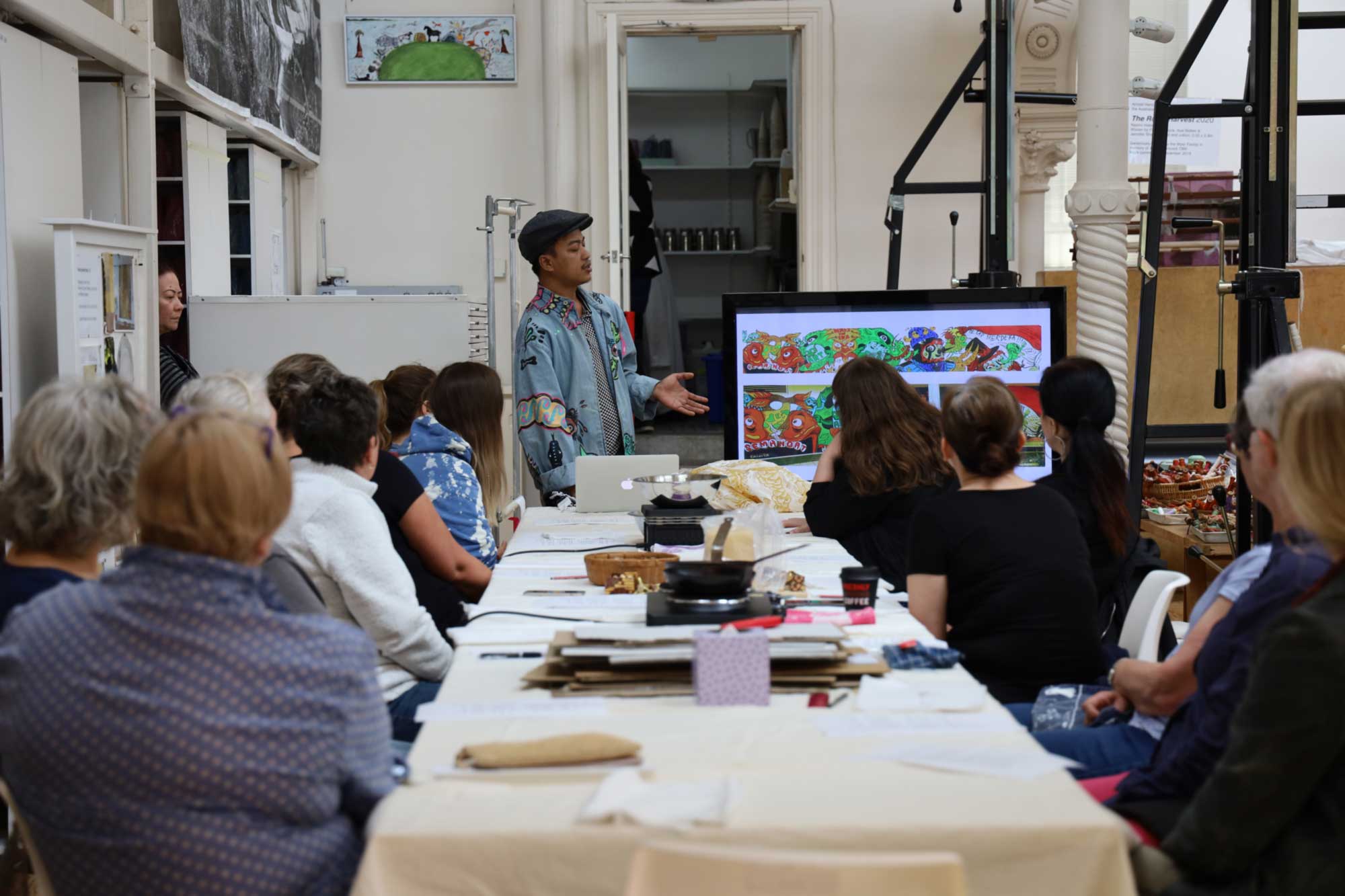 Dias Prabu speaking about his artistic practice to Tulis Batik workshop participants at the ATW. Photo: Dewie Bukit. 