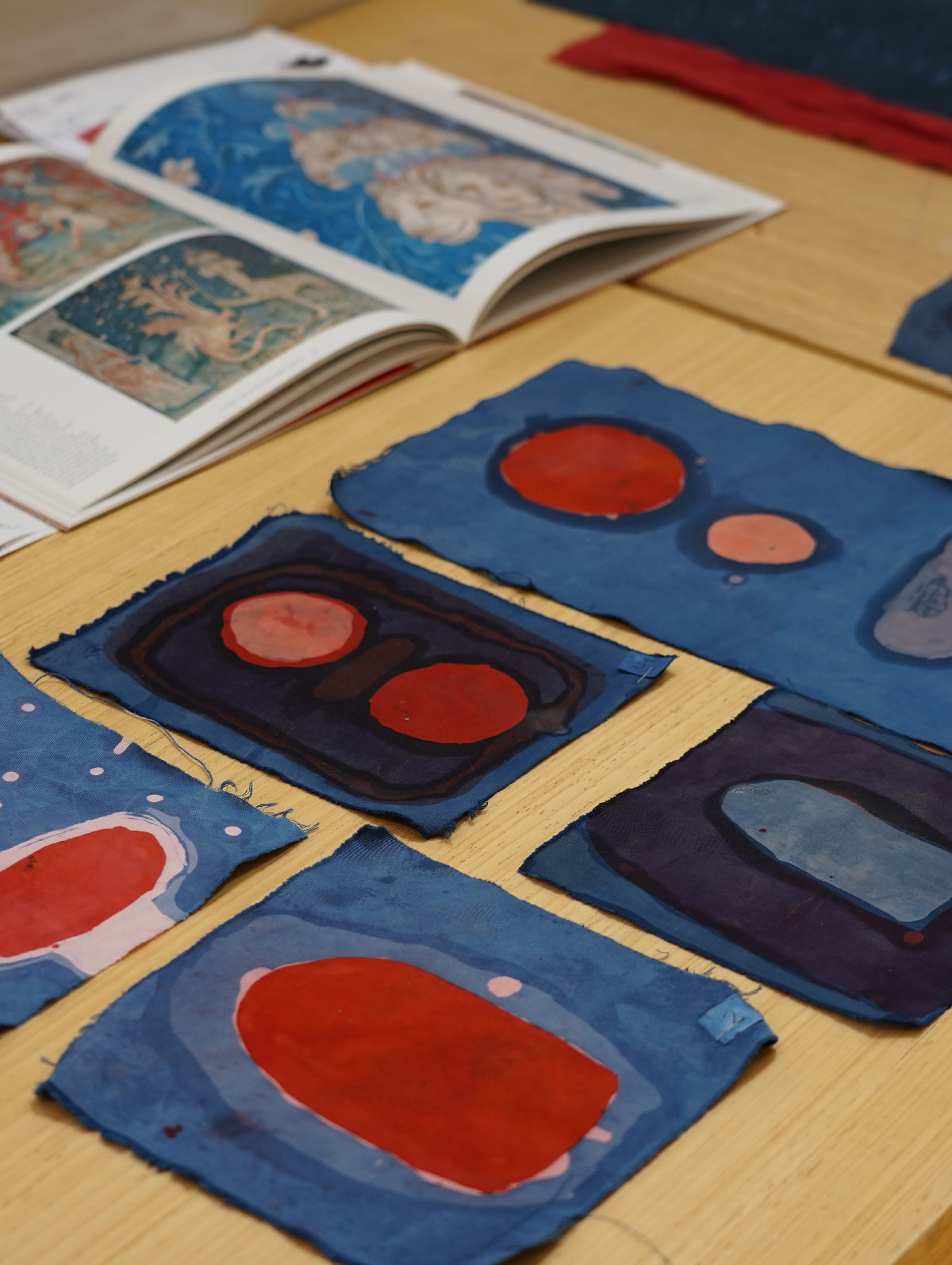 Various experiments of ed and blue dyed fabric