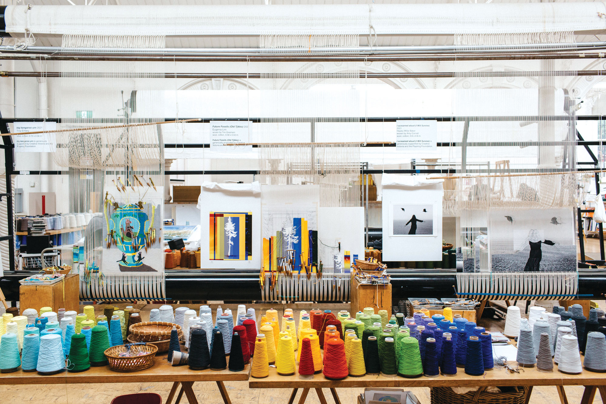 'Weaving Futures' tapestries designed by Troy Emery, Eugenia Lim and Hayley Millar Baker on the looms at ATW. Image: Marie-Luise Skibbe.