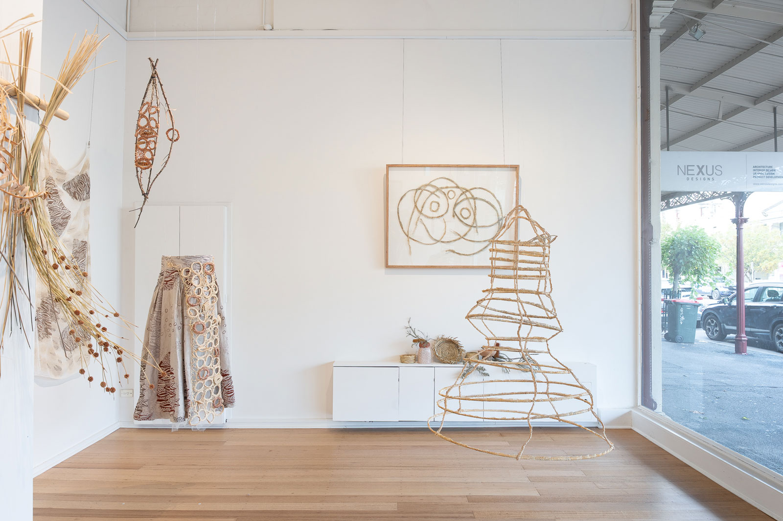Emma Stenhouse, Installation view. Photography by Astrid Mulder. a gallery space, filled with woven natural materials
