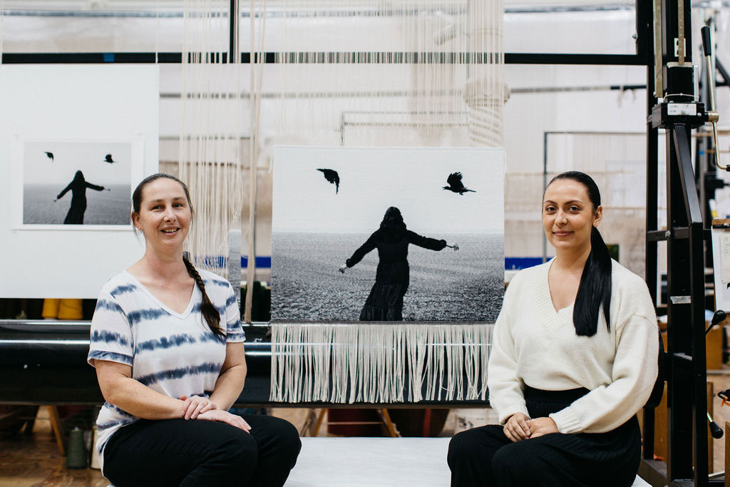 Hayley Millar Baker and Amy Cornall in front of the 'I screamed aloud (I Will Survive)' tapestry at the ATW. Photograph courtesy of Marie-Luise Skibbe.