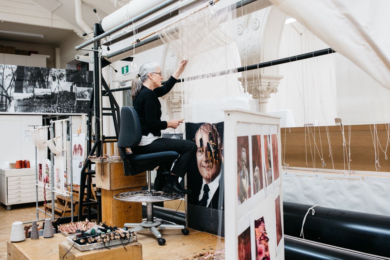 ATW weaver Pamela Joyce working on portrait of John B Reid AO, 2019. Photo by Marie-Luise Skibbe. 