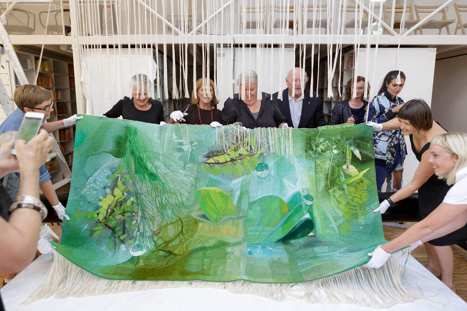 Cutting Off Ceremony for 'Listen, to the Sound of Plants' 2017, designed by Janet Laurence and woven by Chris Cochius, Pamela Joyce & Cheryl Thornton, wool and cotton, 1.2 x 2.4m. Image: Jeremy Weihrauch