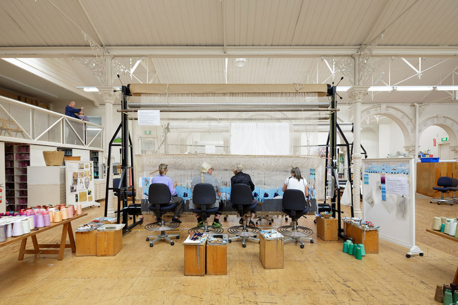 ATW weavers working on 'Treasure Hunt' designed by Guan Wei in 2018 and woven by Chris Cochius, Pamela Joyce, Jennifer Sharpe and Cheryl Thornton, wool and cotton, 0.864 x 3.5m. Photograph: Jeremy Weihrauch.