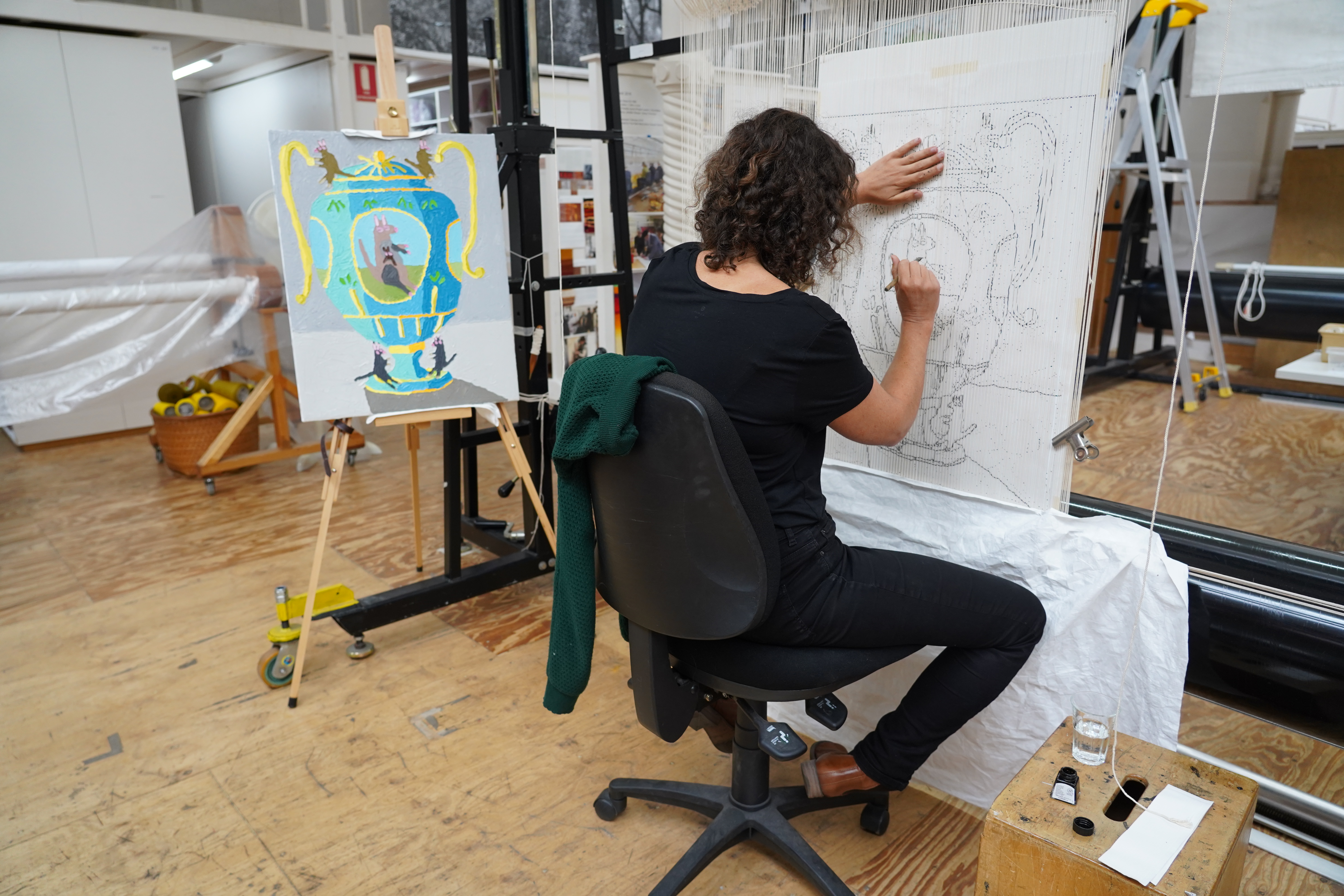 On the loom: ATW weaver Emma Sulzer inking on 'baby kangaroo urn' designed by Troy Emery in 2020. Photograph: ATW.