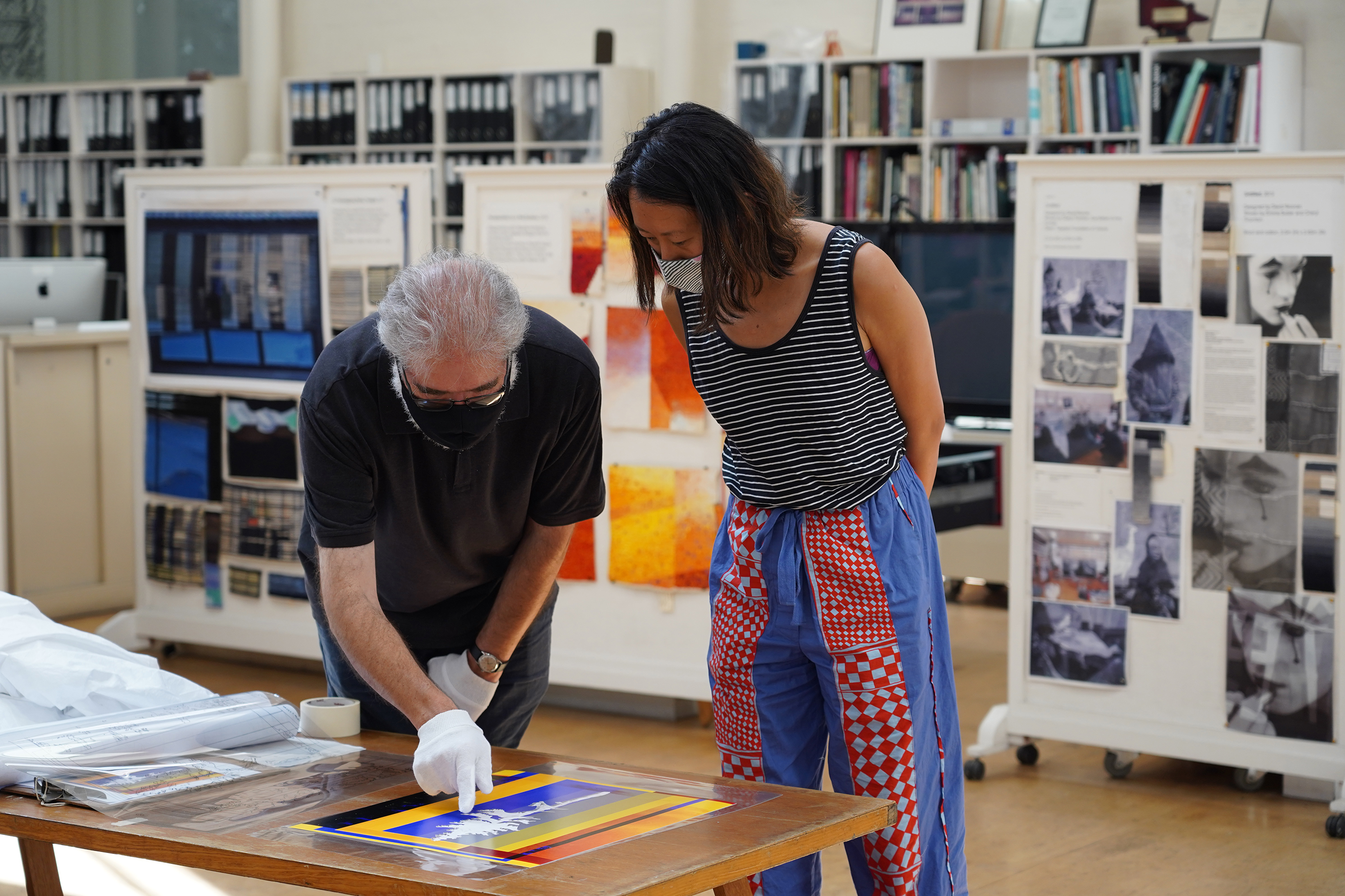 ATW weaver Tim Gresham & artist Eugenia Lim discussing the 'Future Fossils (Old Tjikko)' tapestry design at the ATW, 2021. Image: ATW.